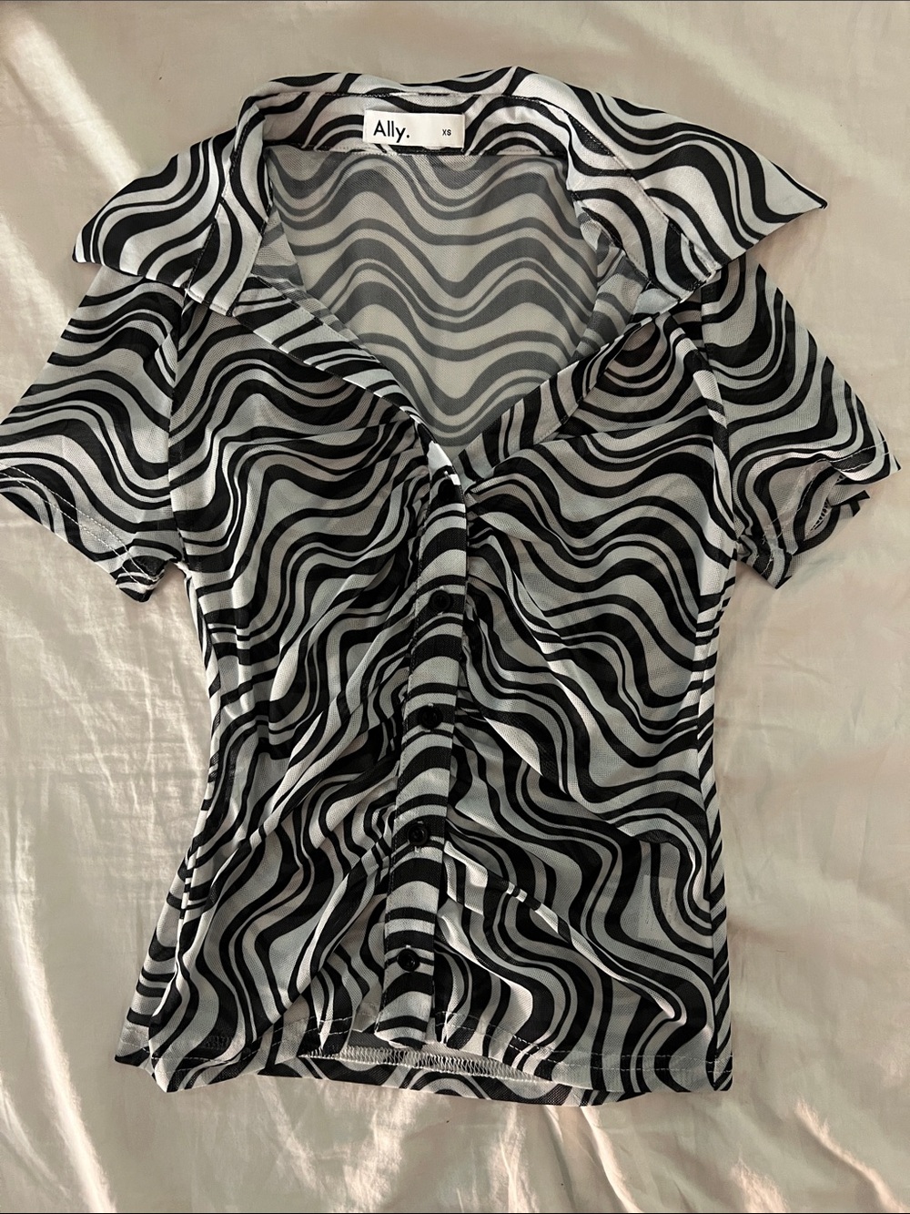 Lightweight zebra print button up top